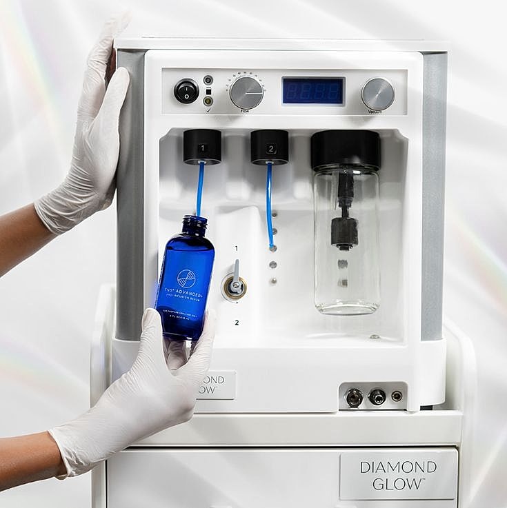 Skincare device with serum application and display.