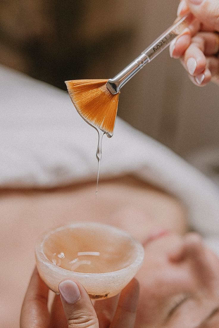 Close-up of a woman's face in sunlight.