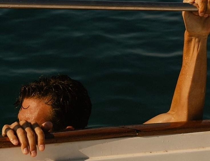 Close-up of a serious young man's face.